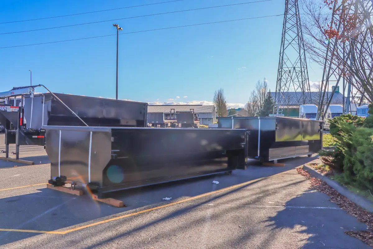 Roll-off dumpster ready for waste disposal at job site for Demolition Dumpster Rental in Lake St. Louis